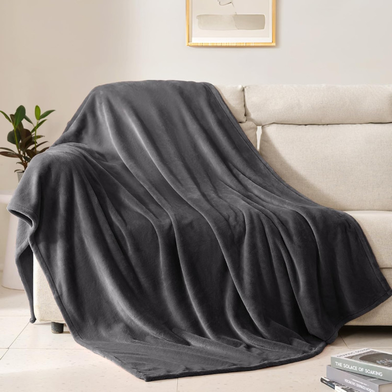 Amazon is selling a fleece blanket for only $10, and it's 'a cozy haven of comfort'
